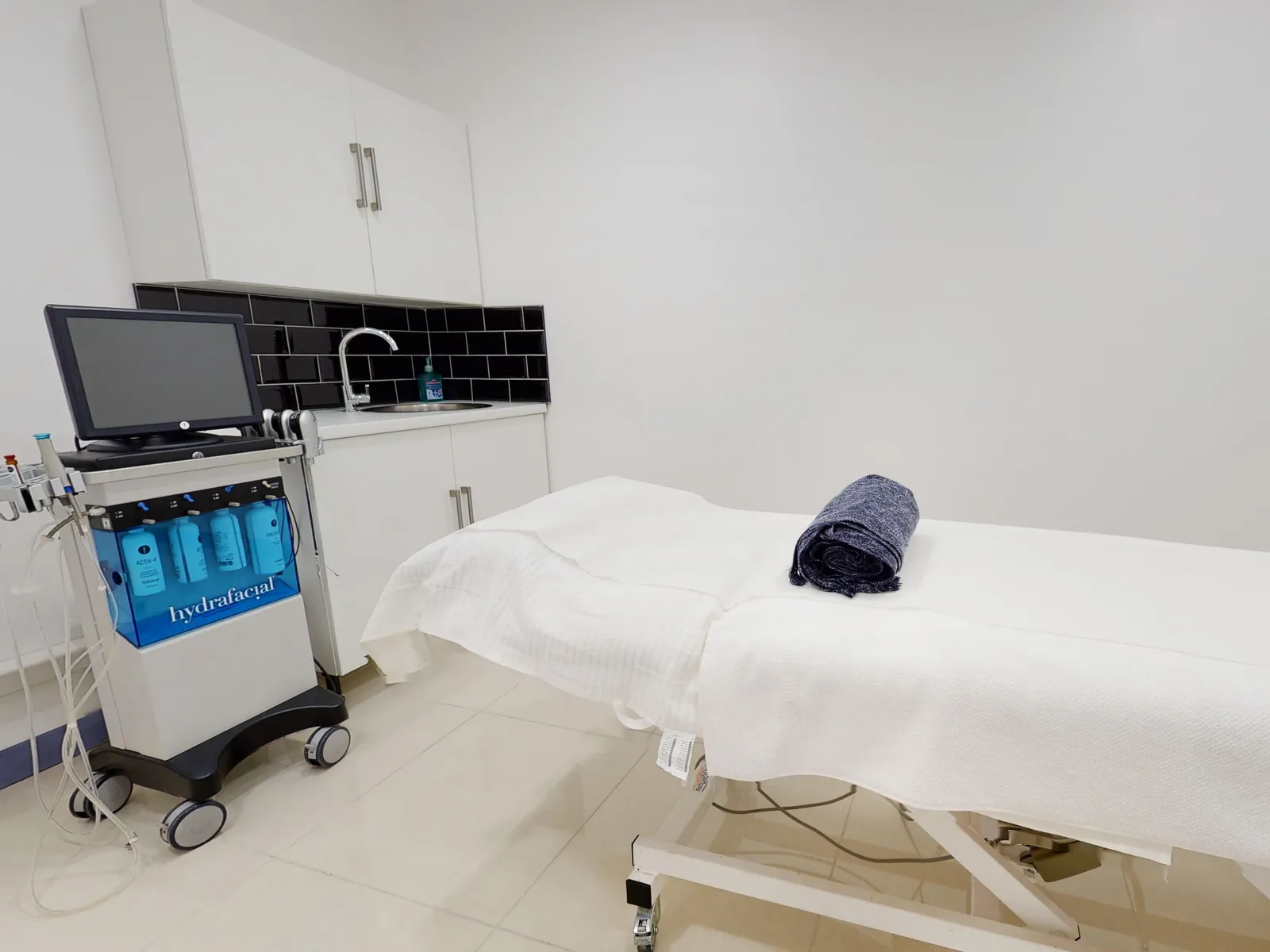 The HydraFacial machine beside the treatment couch at CoLaz Derby